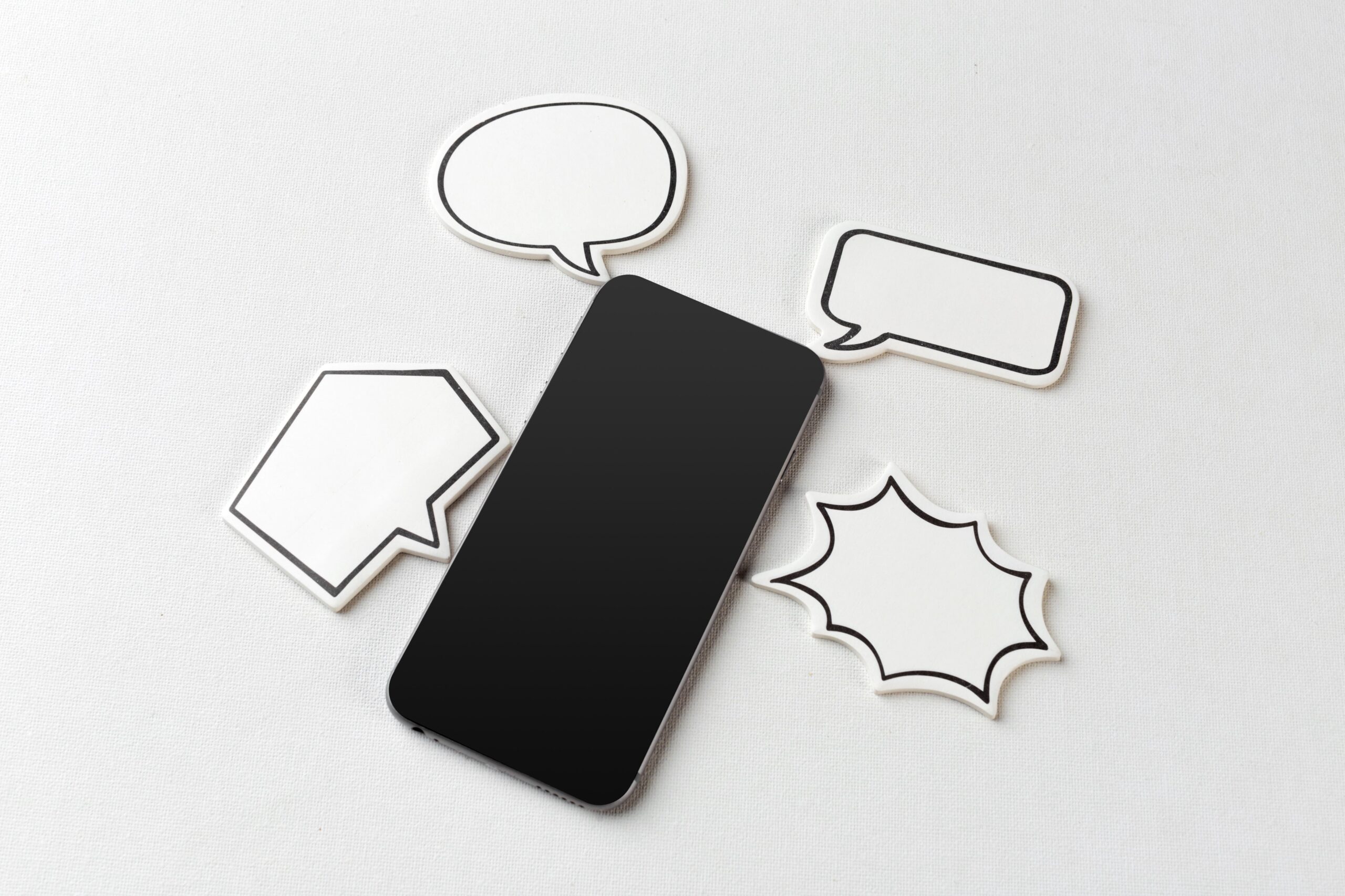 Comparison of generic automated message and friendly dental appointment confirmation text on a phone.